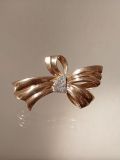 Goldene Maschenbrosche mit Diamanten